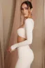 Long Sleeve Ruched Crop Top in Cream sold by Oh Polly