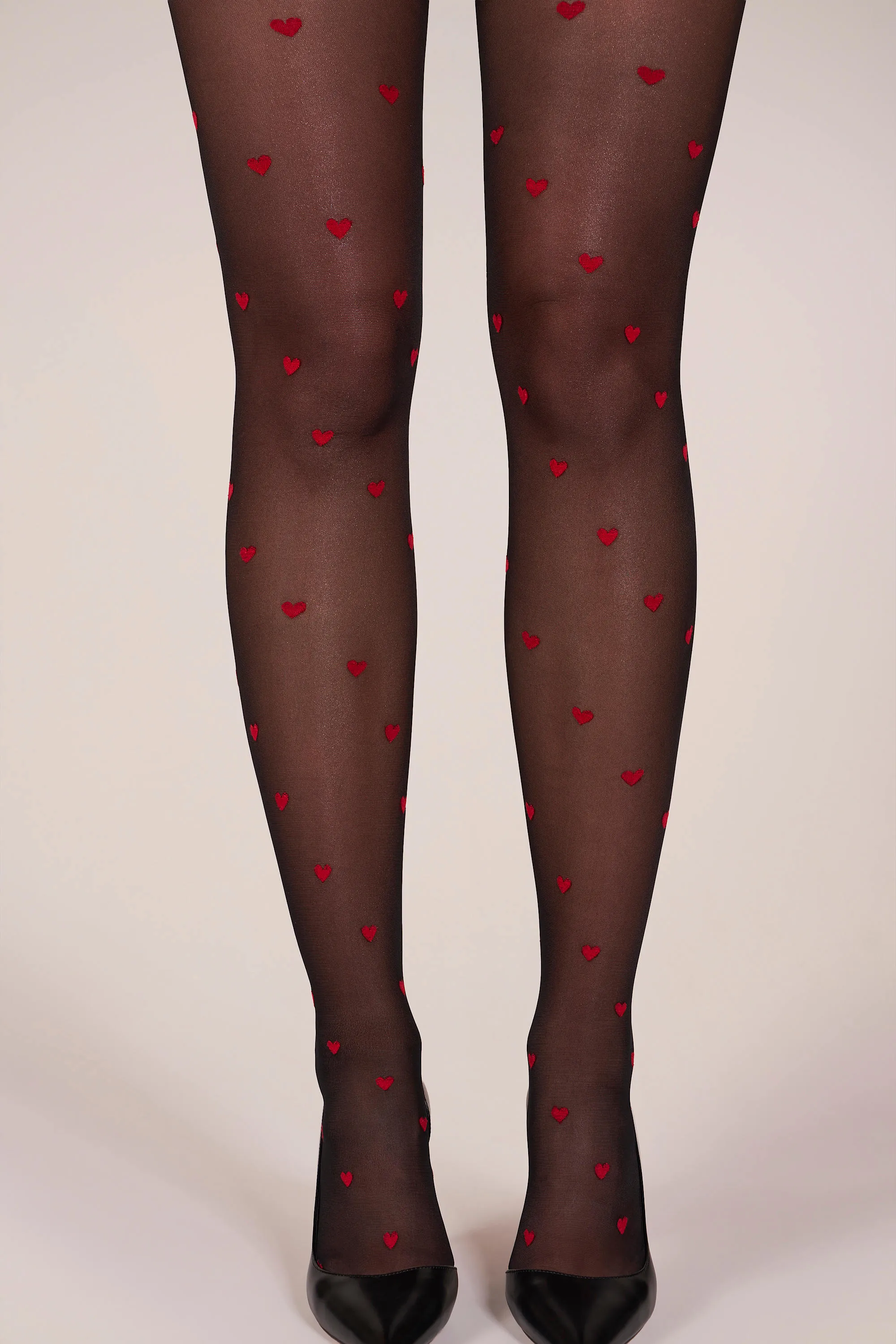 Loveheart Print Tights in Black sold by Oh Polly