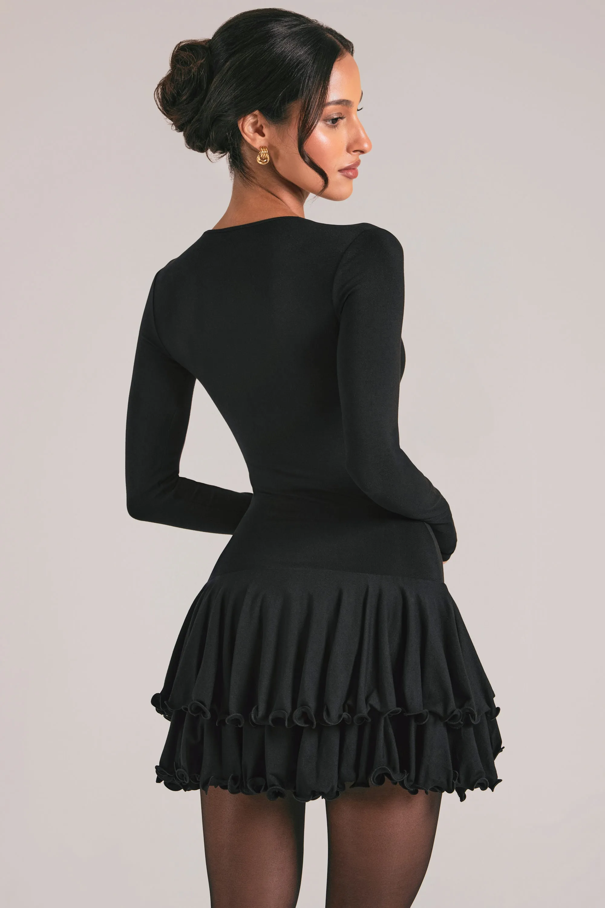 V-Neck Ruffle Skirt Mini Dress in Black sold by Oh Polly product image thumbnail 2