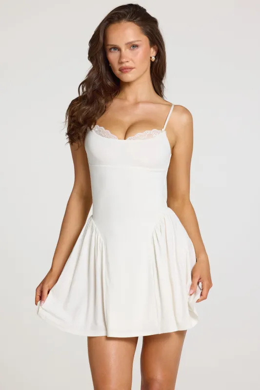 Modal Lace-Trim Mini Dress in White made by Oh Polly