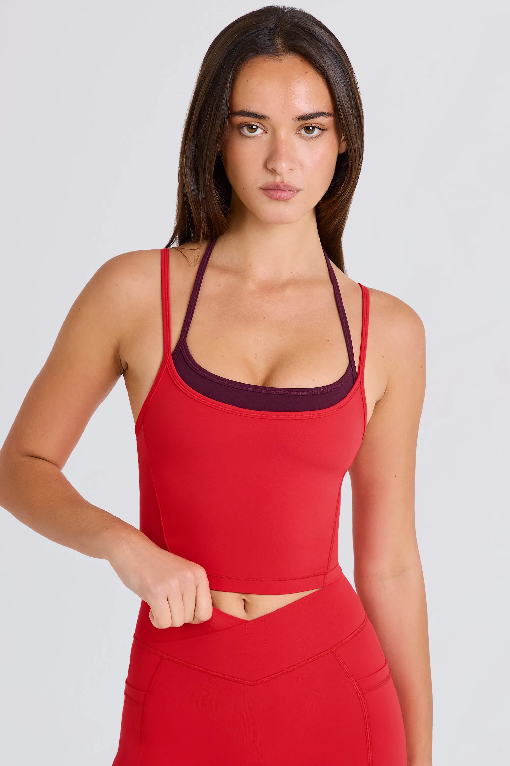 Soft Active Layered Cropped Tank Top in Strawberry sold by Oh Polly