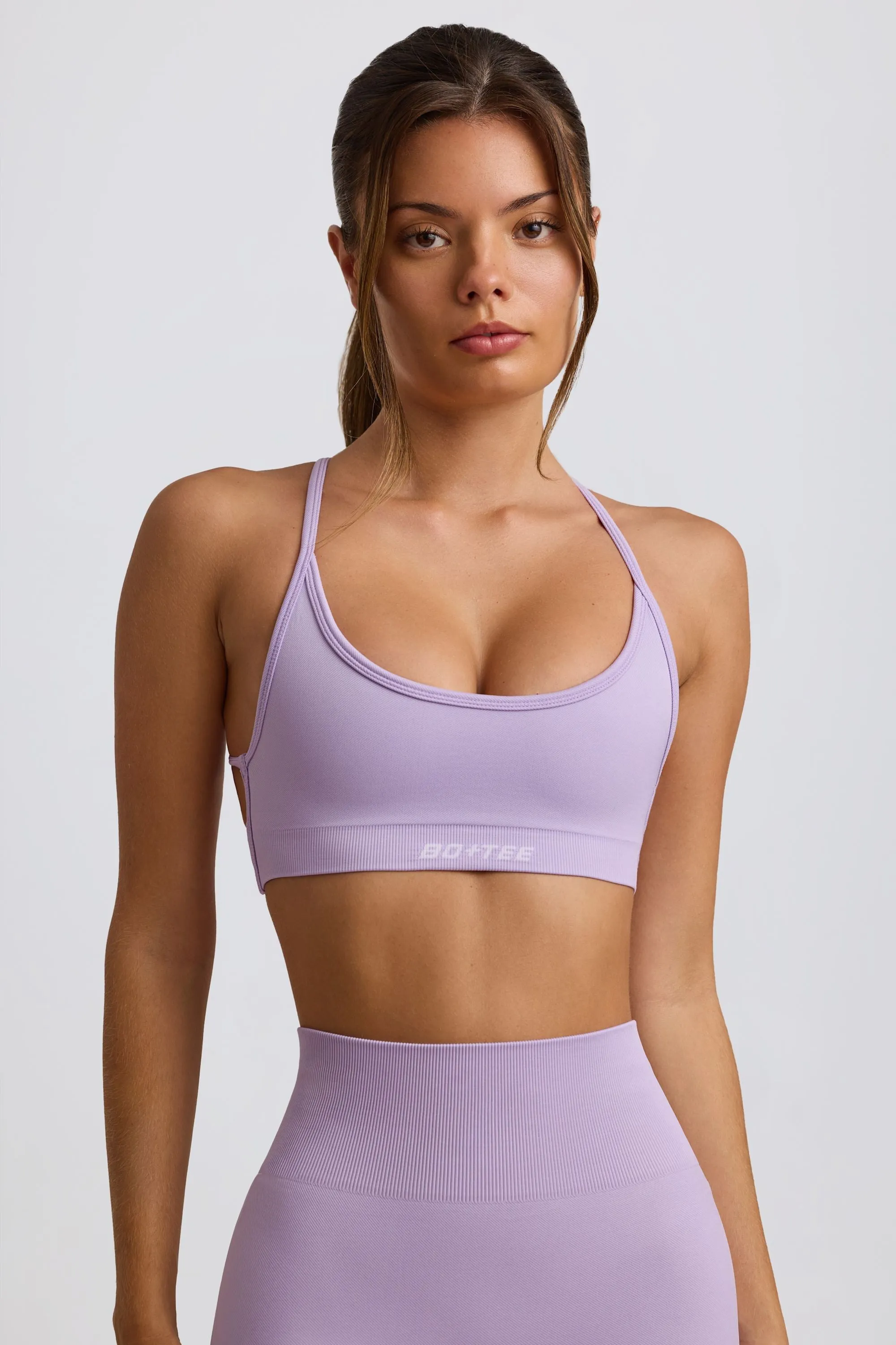 Super Sculpt Seamless Backless Sports Bra in Lavender sold by Oh Polly