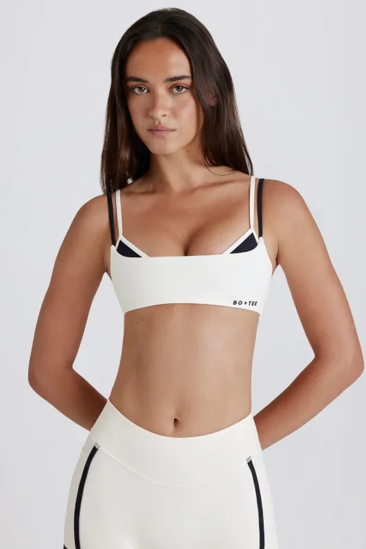 Soft Active Twist-Back Layered Sports Bra in Coconut made by Bo + Tee