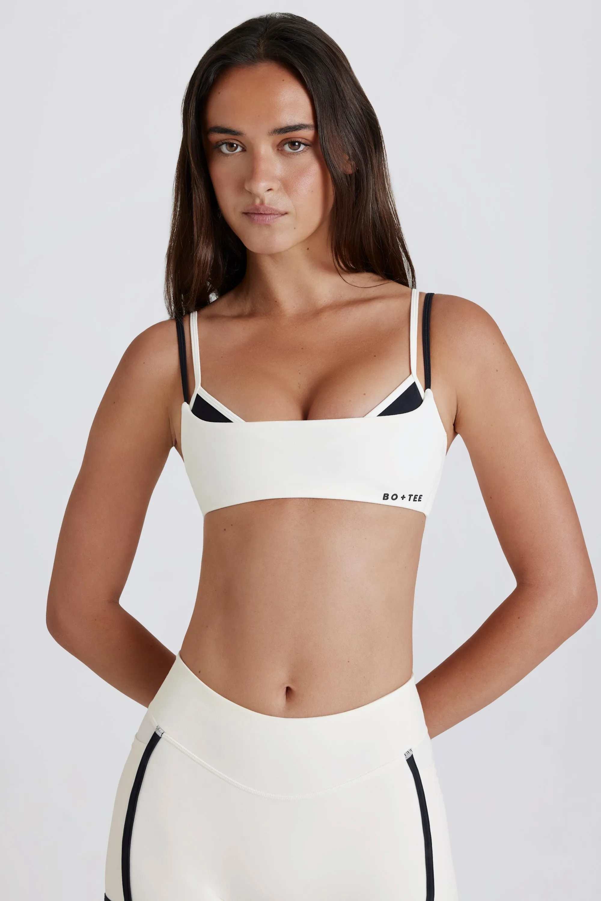 Soft Active Twist-Back Layered Sports Bra in Coconut sold by Oh Polly