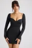Long Sleeve Sweetheart Neckline Mini Dress in Black sold by Oh Polly