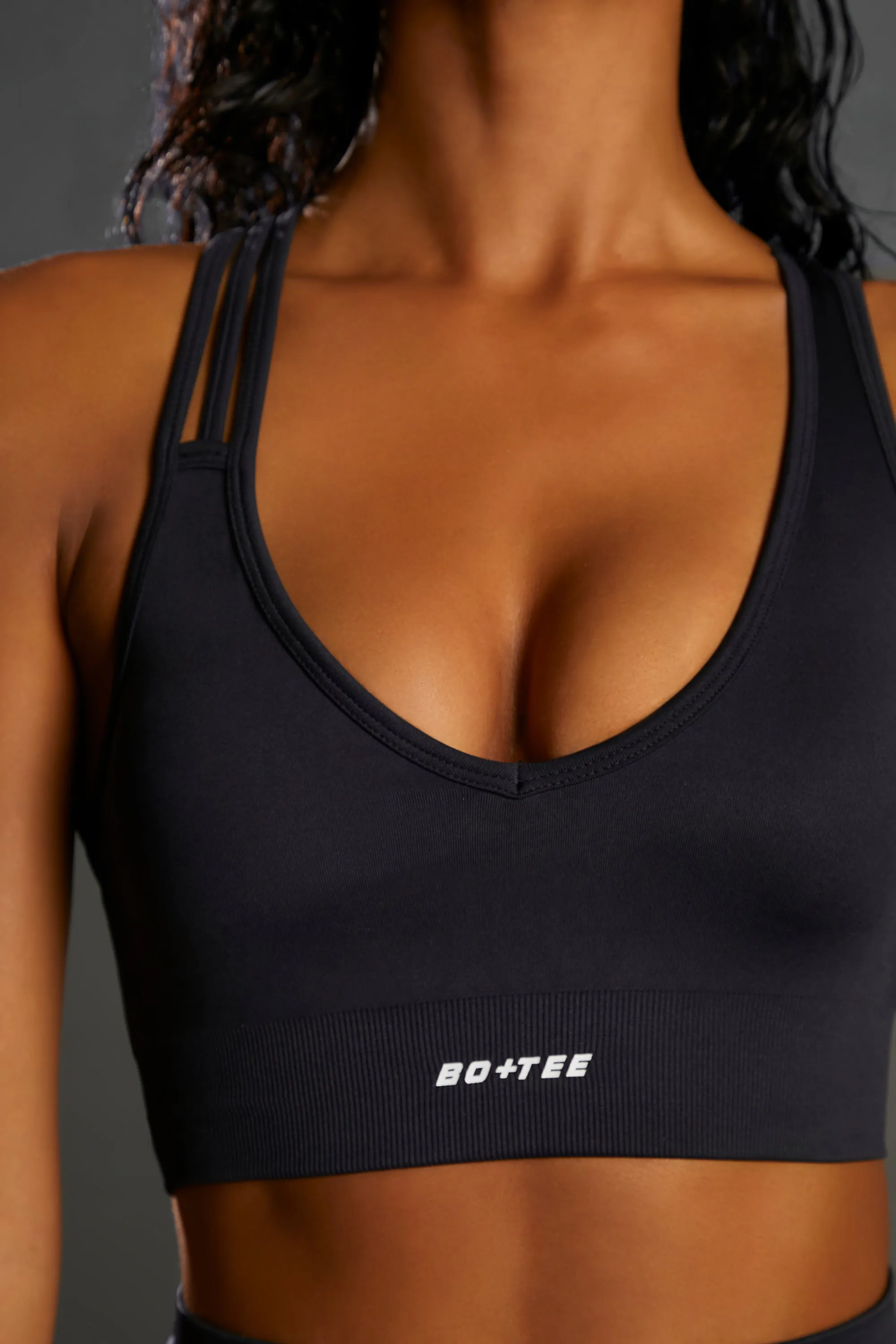 Emerge Cross Strap Seamless Plunge Sports Bra in Black sold by Oh Polly product image thumbnail 4