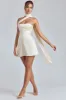 Draped Halterneck Satin Mini Dress in Ivory sold by Oh Polly