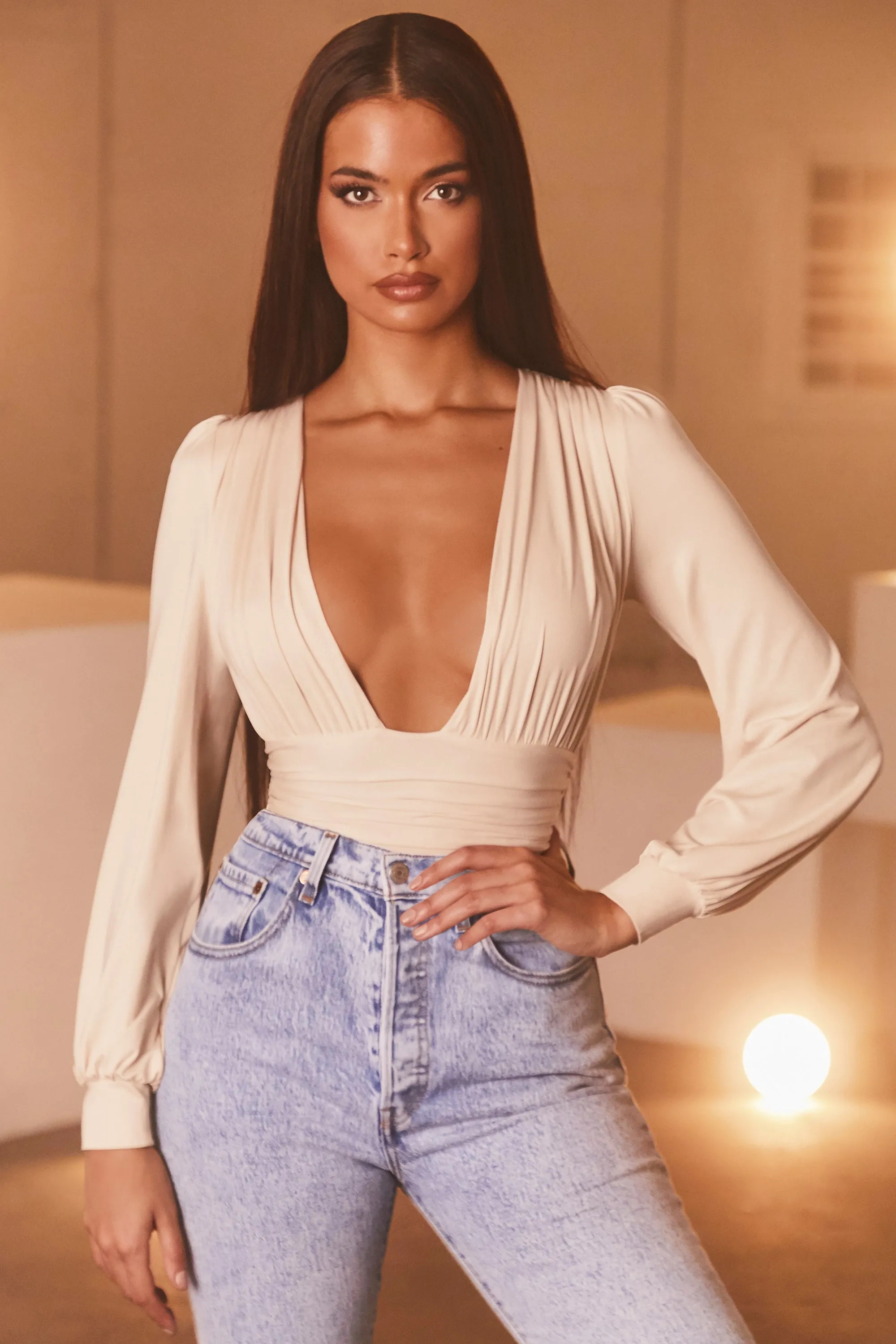 Plunge Neck Long Sleeve Bodysuit in Cream sold by Oh Polly product image thumbnail 4