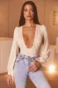 Plunge Neck Long Sleeve Bodysuit in Cream sold by Oh Polly