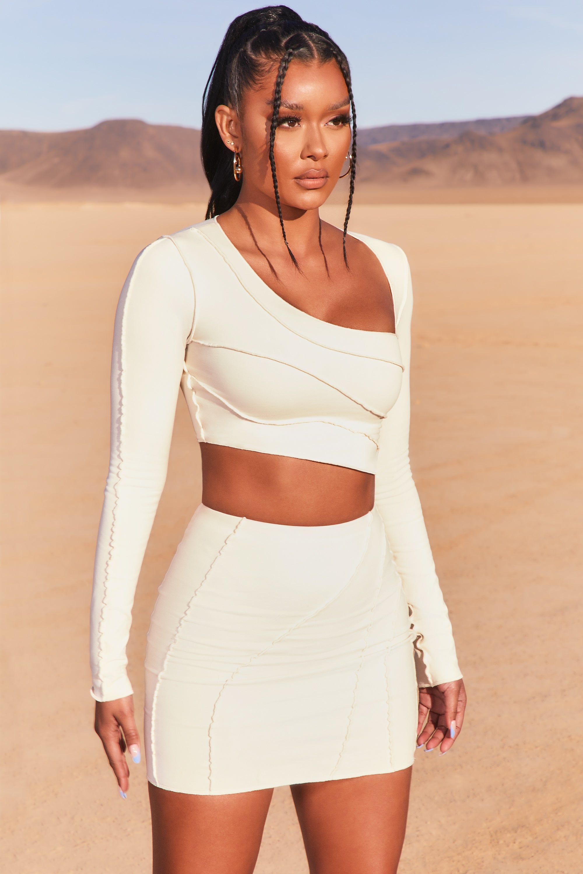 Exposed Seam Mini Skirt in Ivory sold by Oh Polly