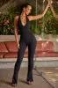 Petite Halter Neck Plunge Jumpsuit in Black sold by Oh Polly