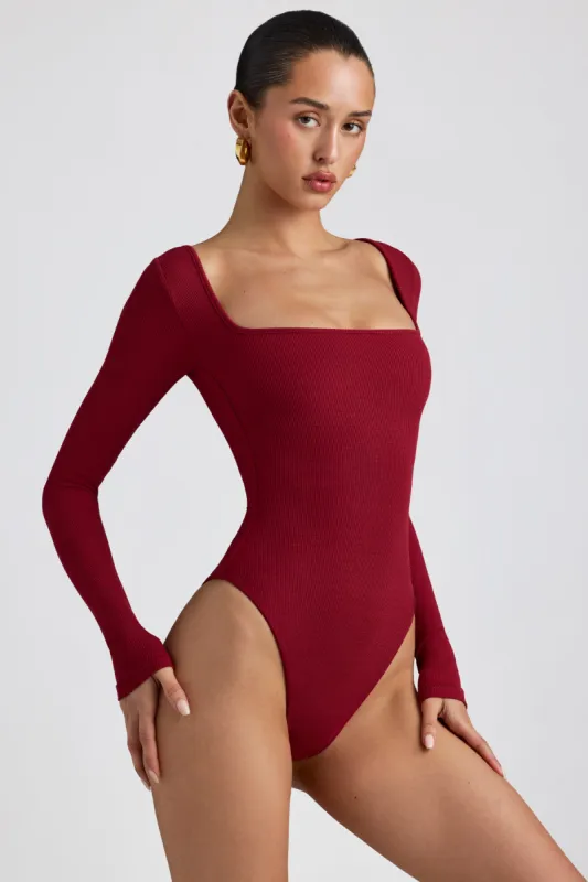 Ribbed Modal Long Sleeve Bodysuit in Maroon sold by Oh Polly