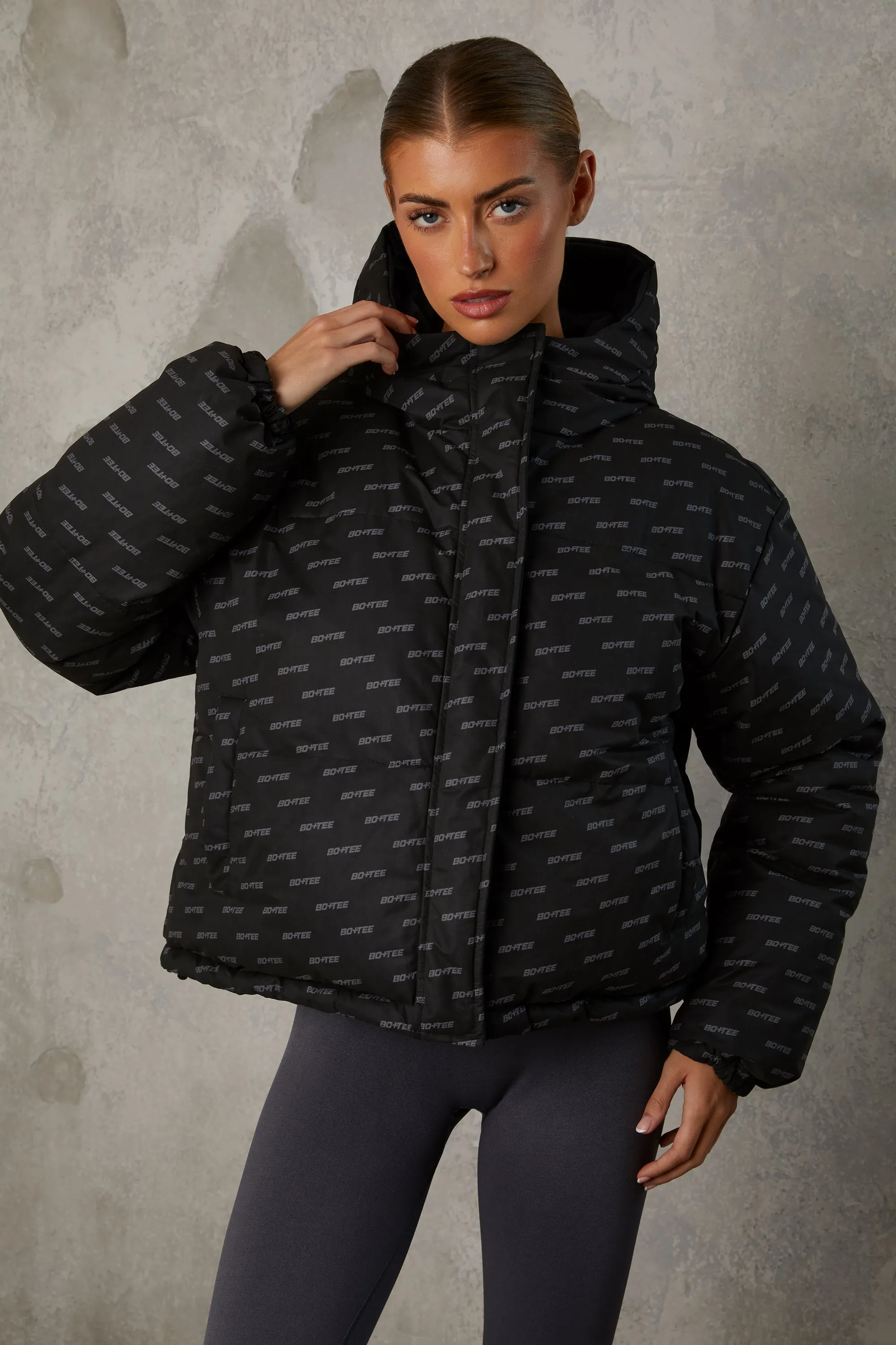 Reversible Hooded Puffer Jacket in Black sold by Oh Polly product image thumbnail 5