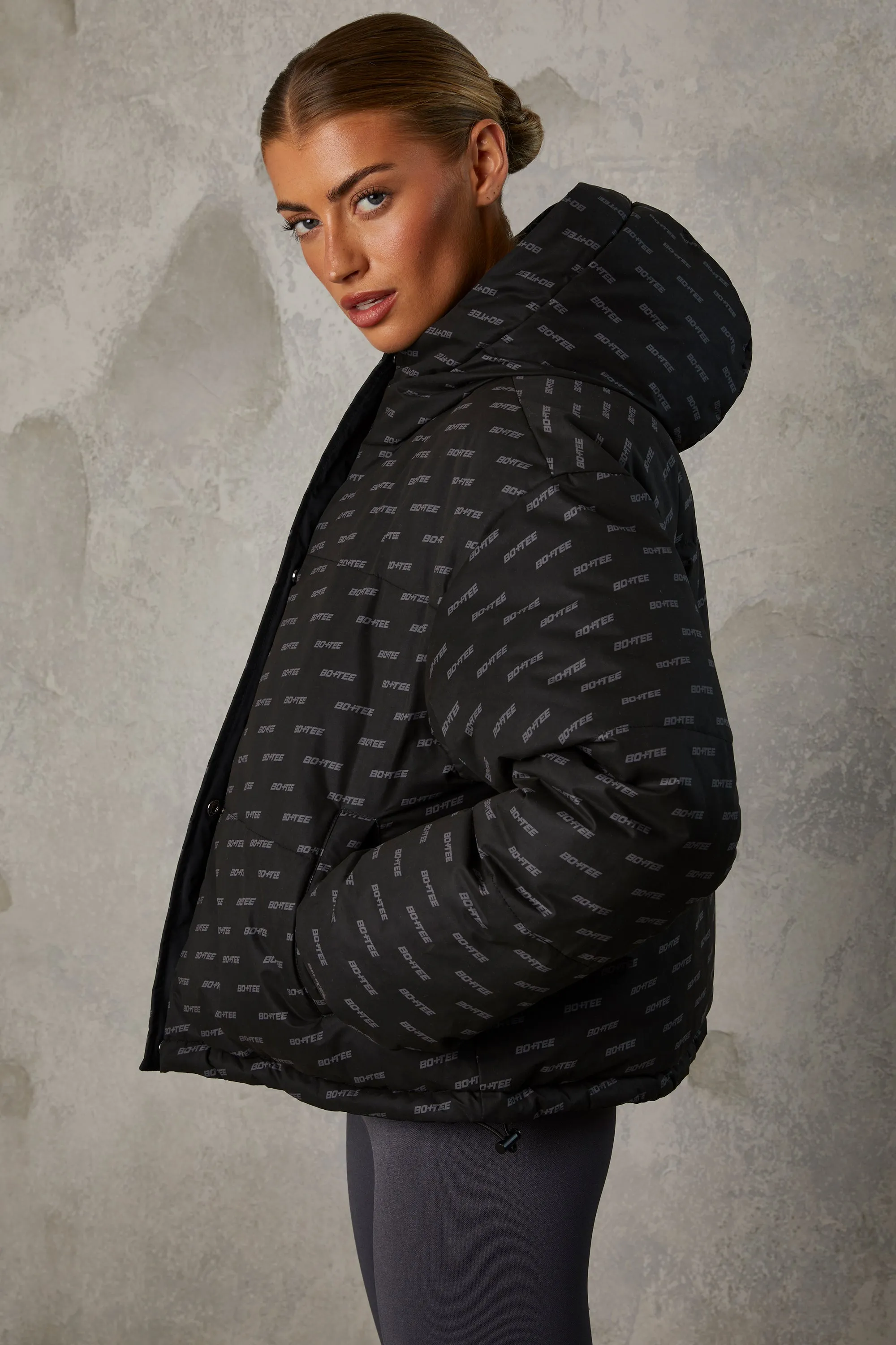 Reversible Hooded Puffer Jacket in Black sold by Oh Polly product image thumbnail 3