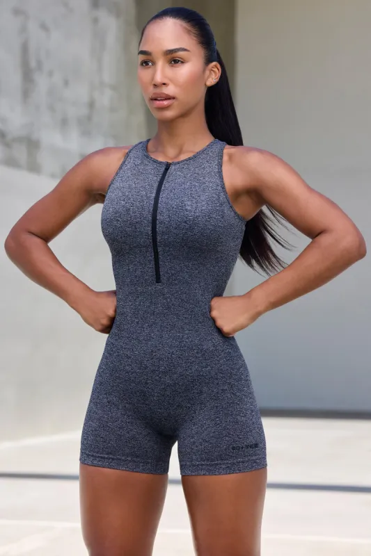 Super Sculpt Seamless Zip Up Unitard in Marl Black sold by Oh Polly