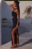Asymmetric Neckline Ruched Cut Out Maxi Dress in Black sold by Oh Polly