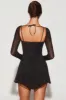 Embellished Long Sleeve Angled Hem Mini Dress in Black sold by Oh Polly