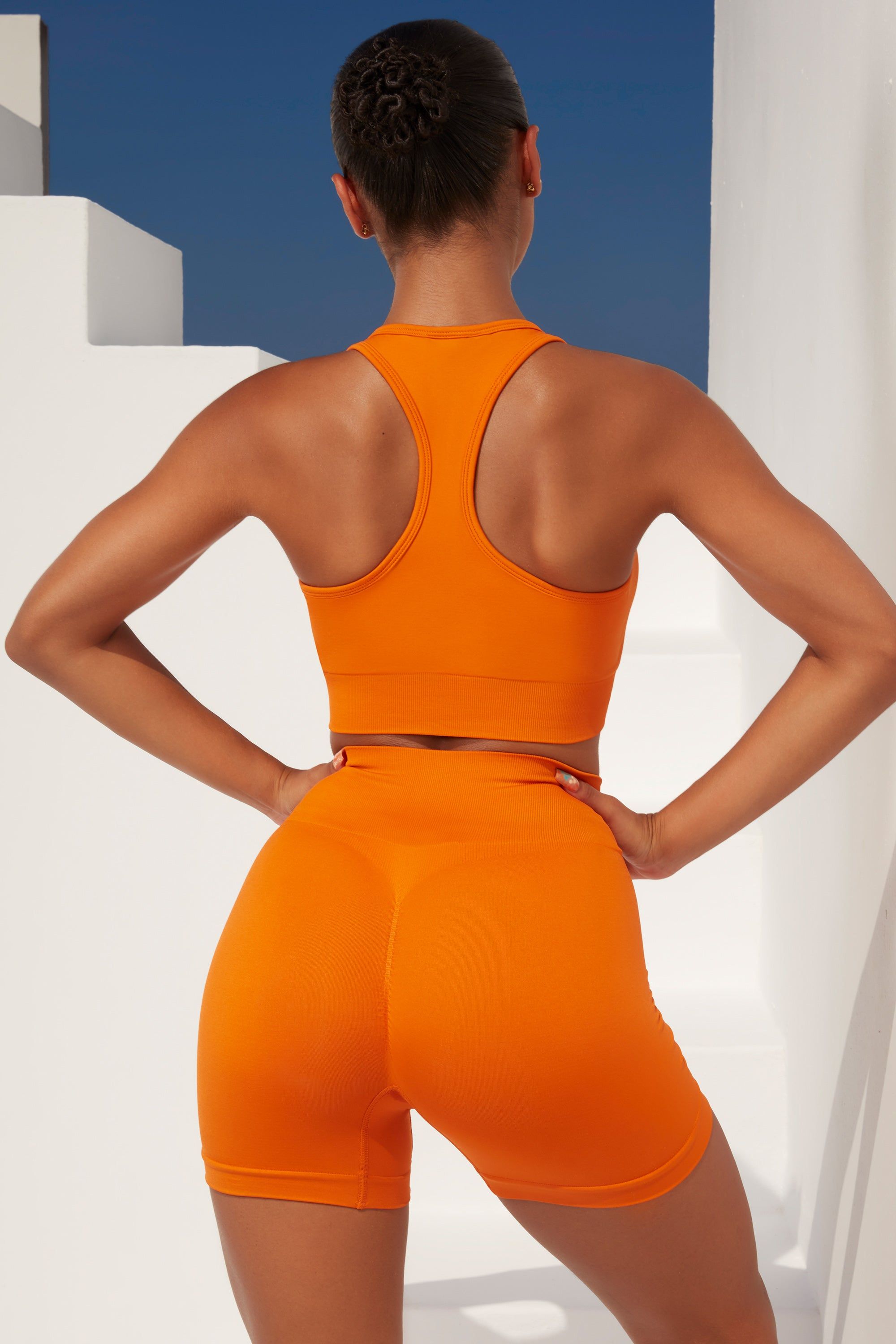 Radiate Ruched Sports Bra in Deep Orange sold by Oh Polly product image thumbnail 3