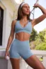 Cut Out Back Sports Bra in Ice Blue sold by Oh Polly