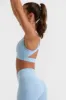 Cut Out Back Sports Bra in Ice Blue sold by Oh Polly