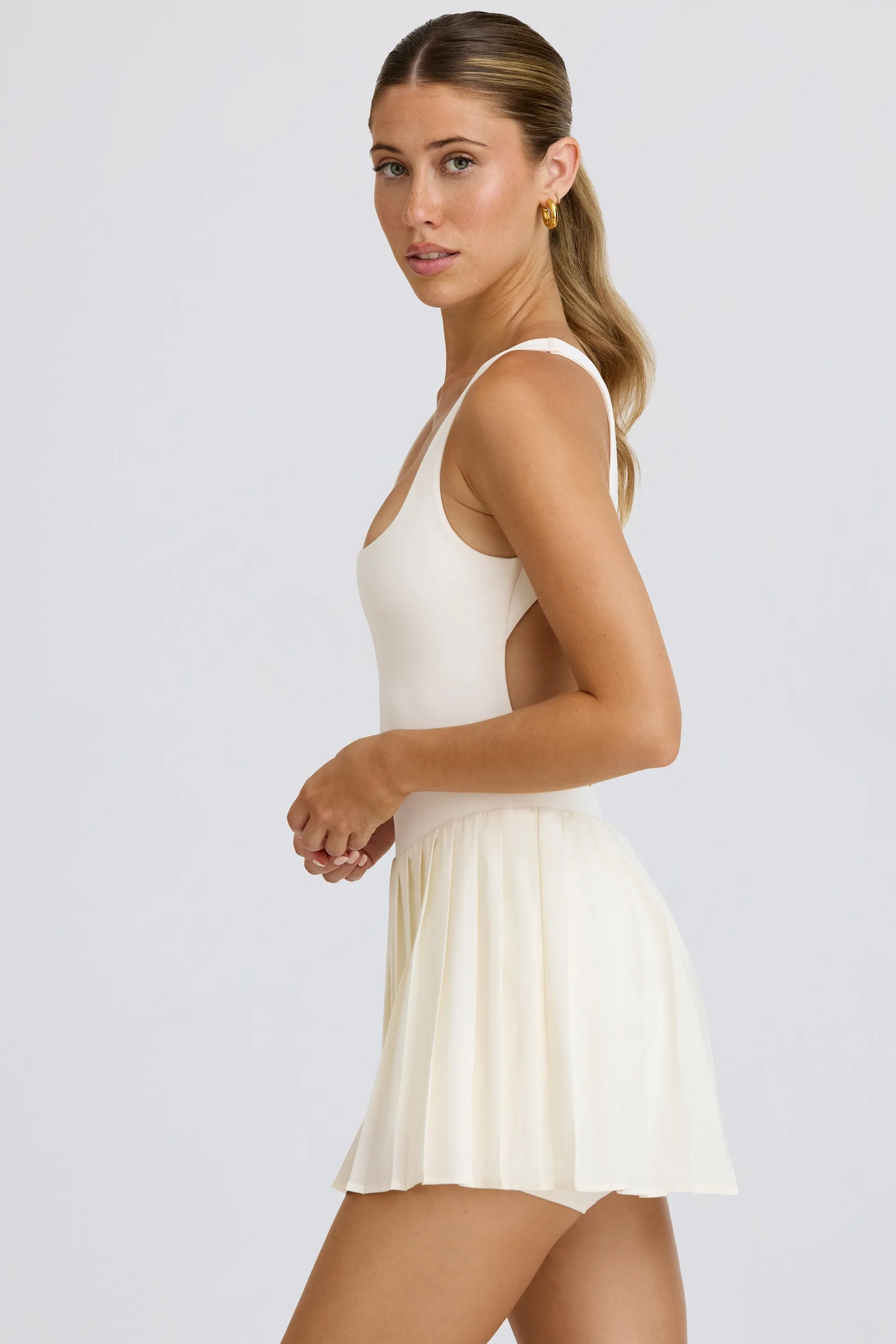 Soft Active Open-Back Pleated Tennis Dress in White sold by Oh Polly product image thumbnail 3