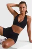 Cut Out Back Sports Bra in Black sold by Oh Polly