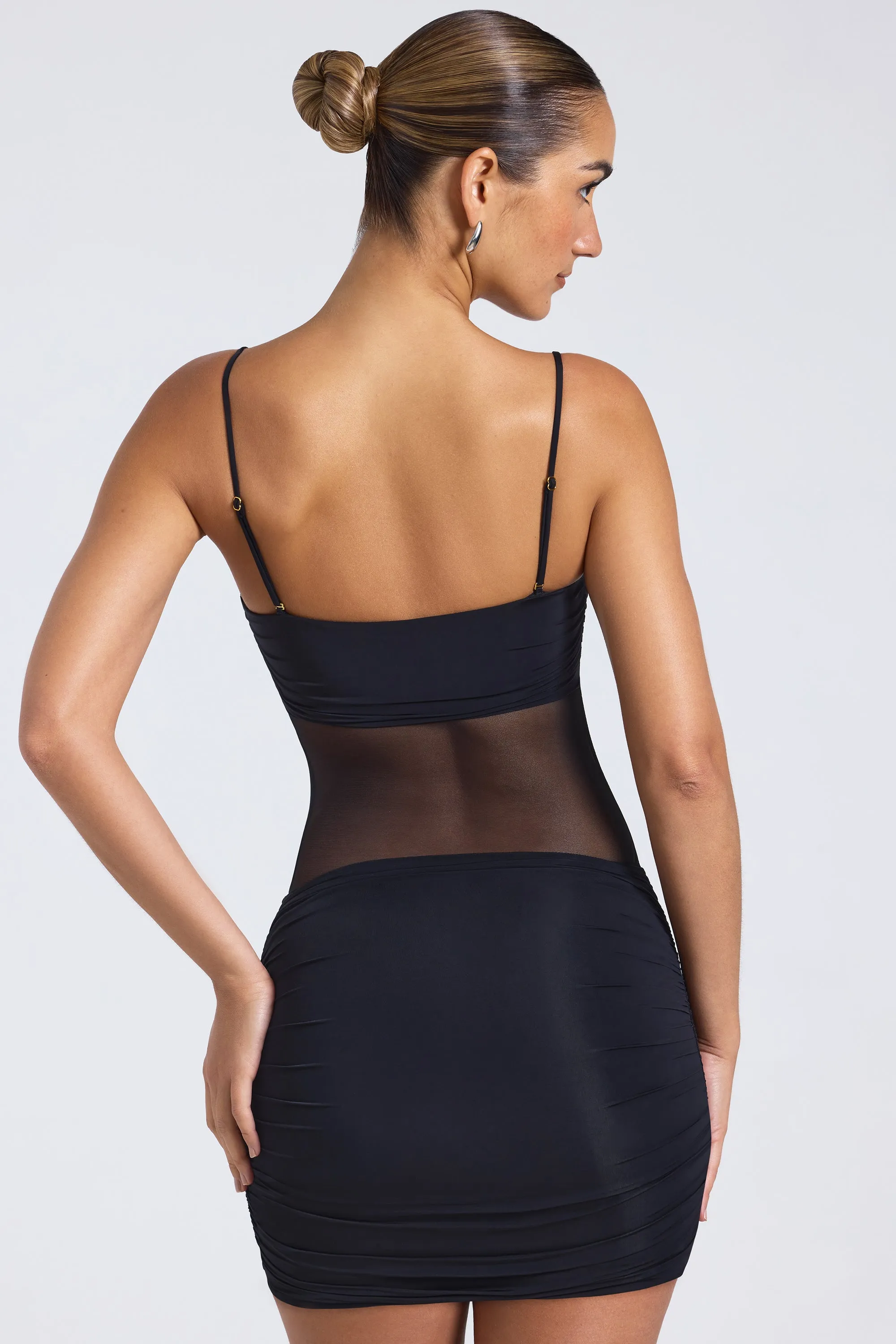 Sheer Panelled Ruched Mini Dress in Black sold by Oh Polly product image thumbnail 2