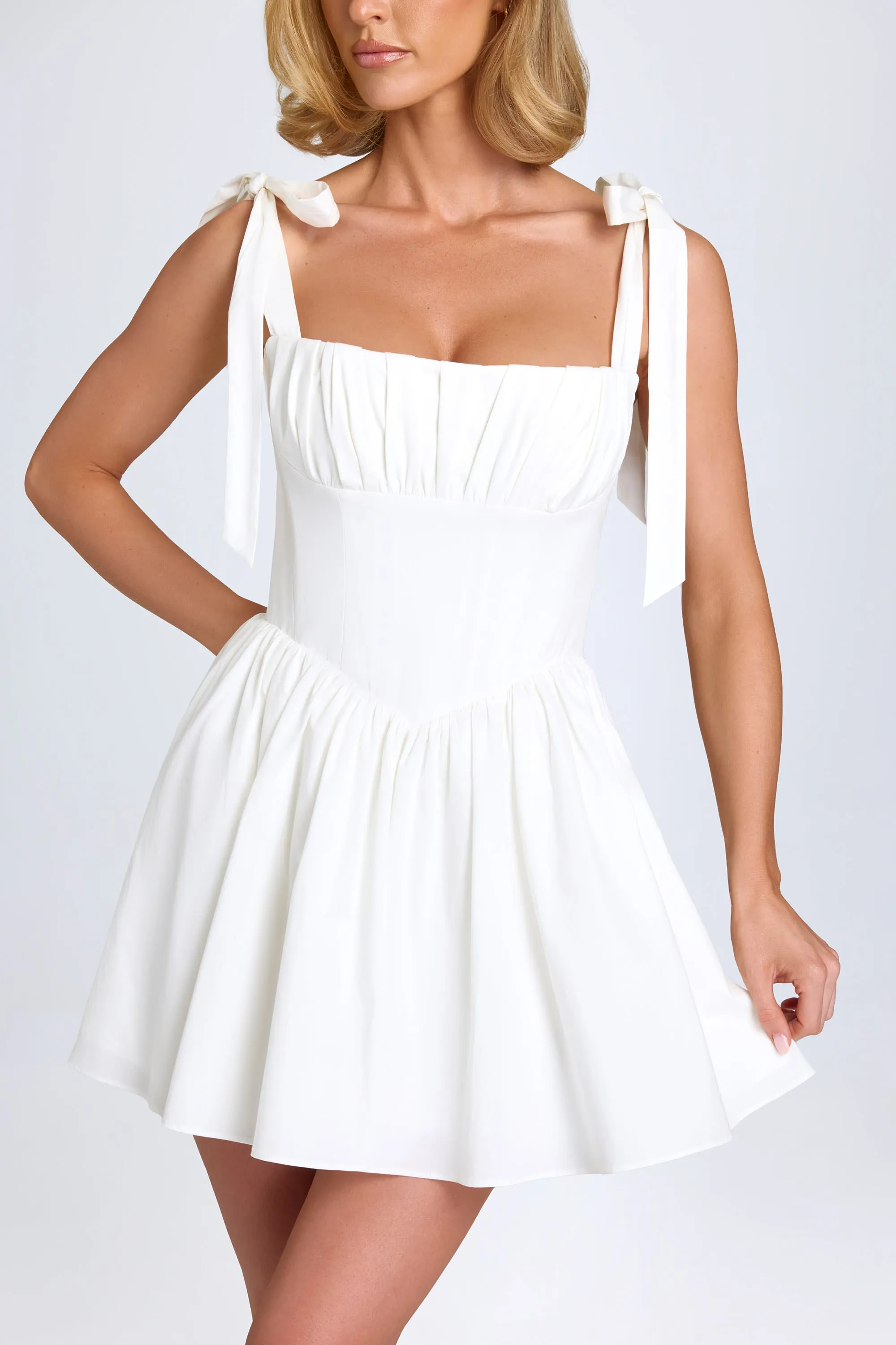 Ruched Corset Mini Dress in White sold by Oh Polly product image thumbnail 5