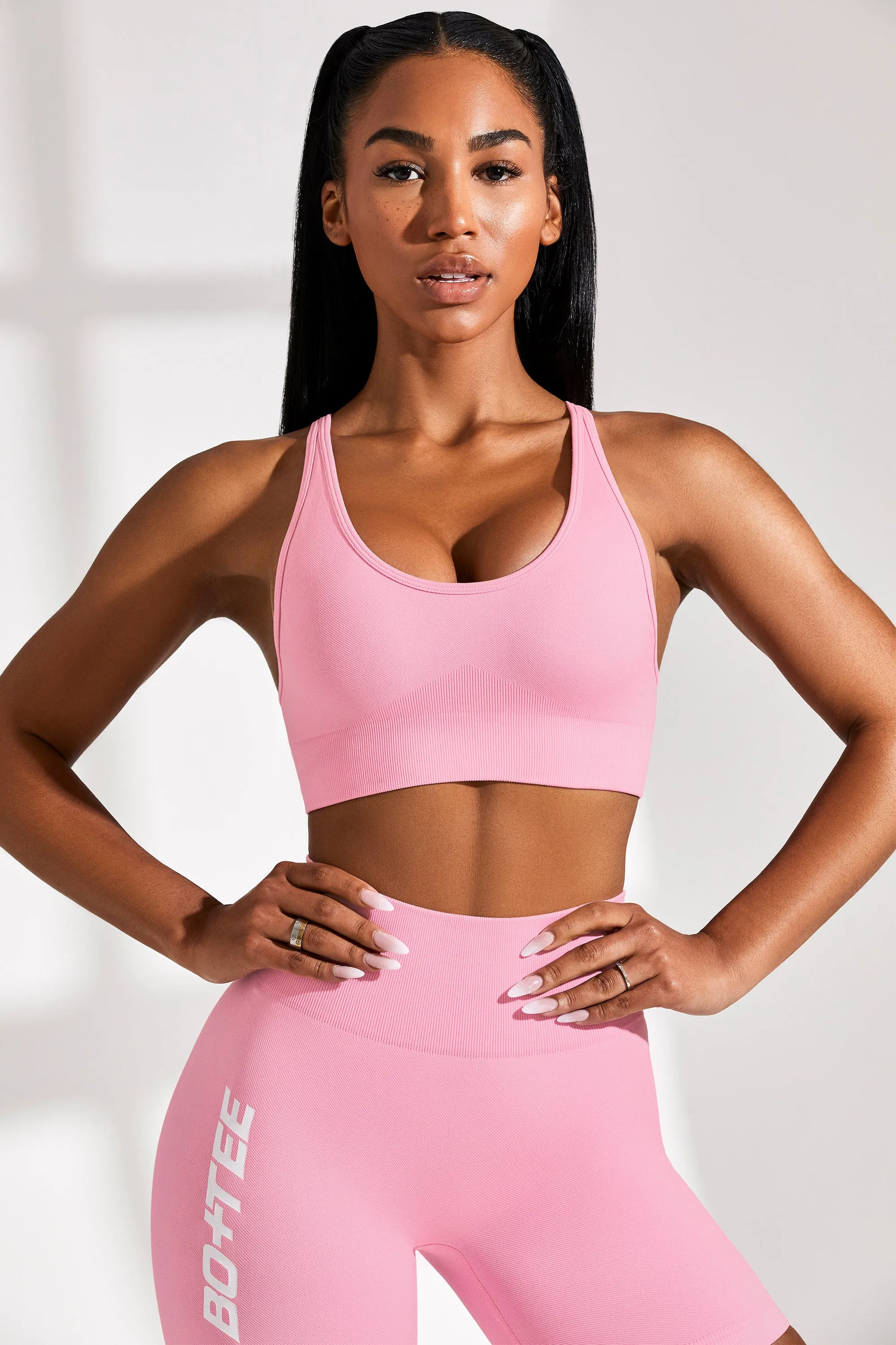 Plunge Neckline Sports Bra in Pink sold by Oh Polly