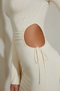 Ruched Cut Out Sides Long Sleeve Mini Dress in Ivory sold by Oh Polly