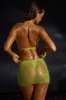 Low-Rise Mini Skirt in Green sold by Oh Polly