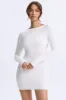 Open-Back Bodycon Mini Dress in White sold by Oh Polly
