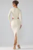 Premium Jersey Long Sleeve Cut Out Maxi Dress in Ivory sold by Oh Polly