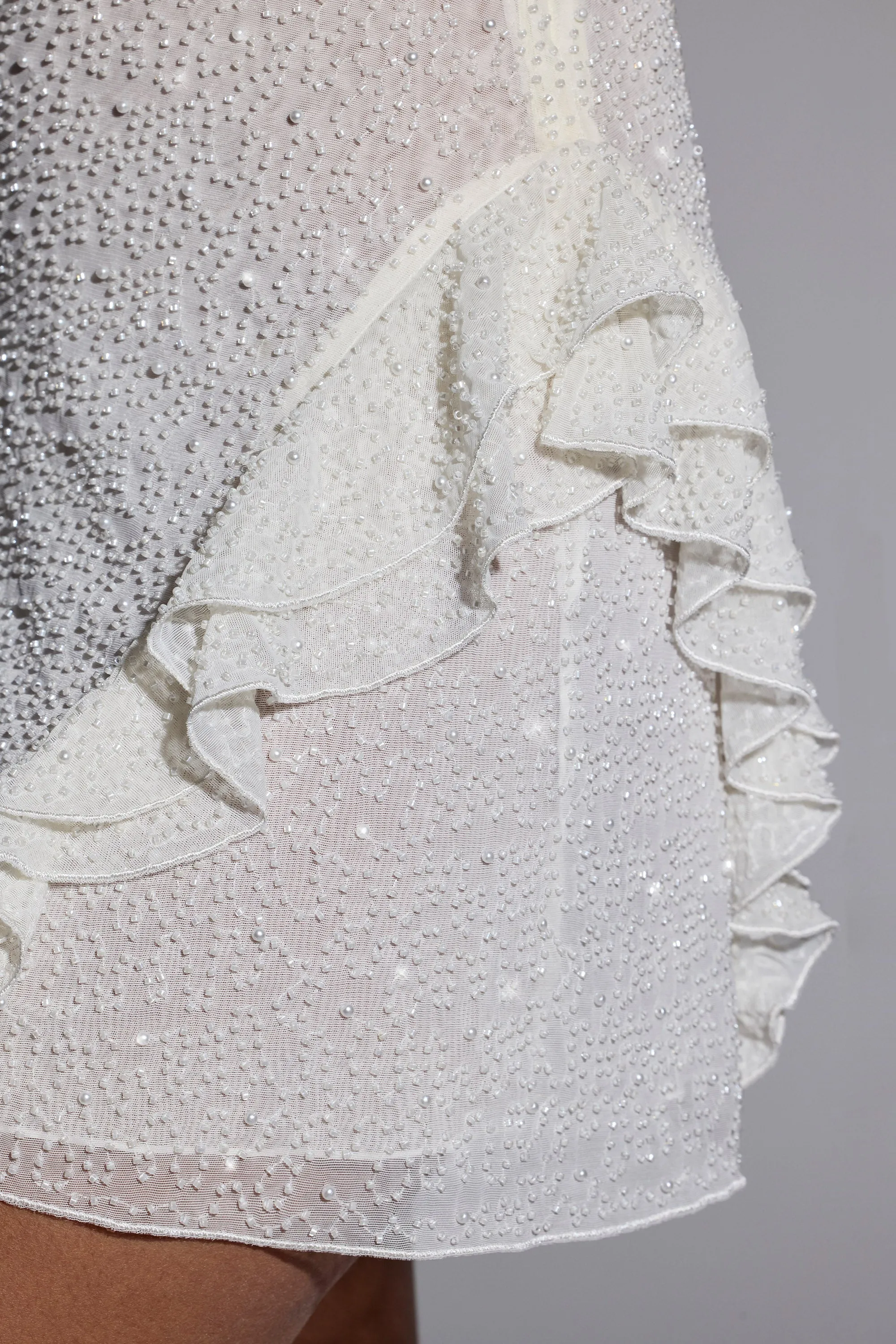 Embellished Frill Mini Dress in White sold by Oh Polly product image thumbnail 4