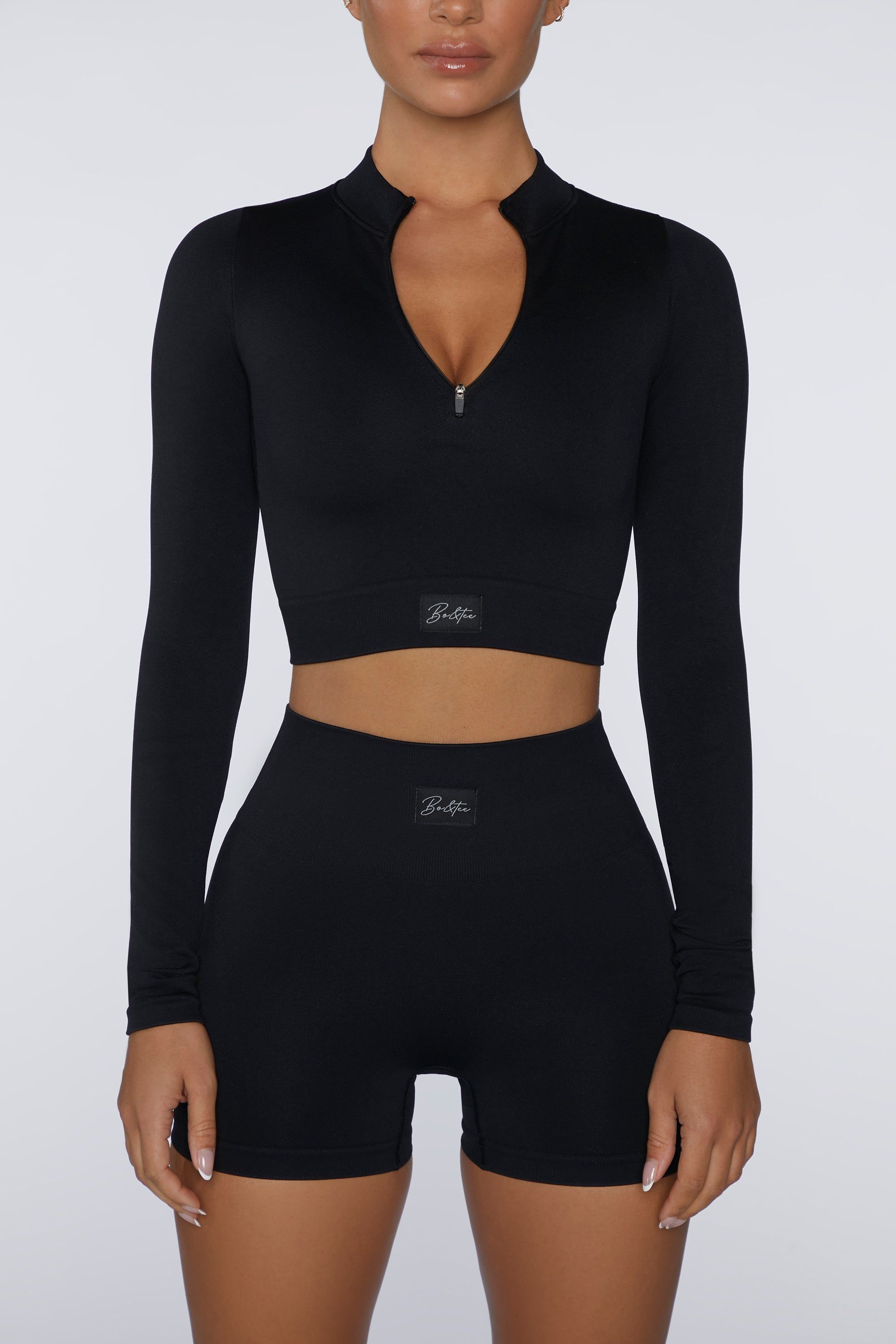 Long Sleeve Crop Top in Black sold by Oh Polly product image thumbnail 2