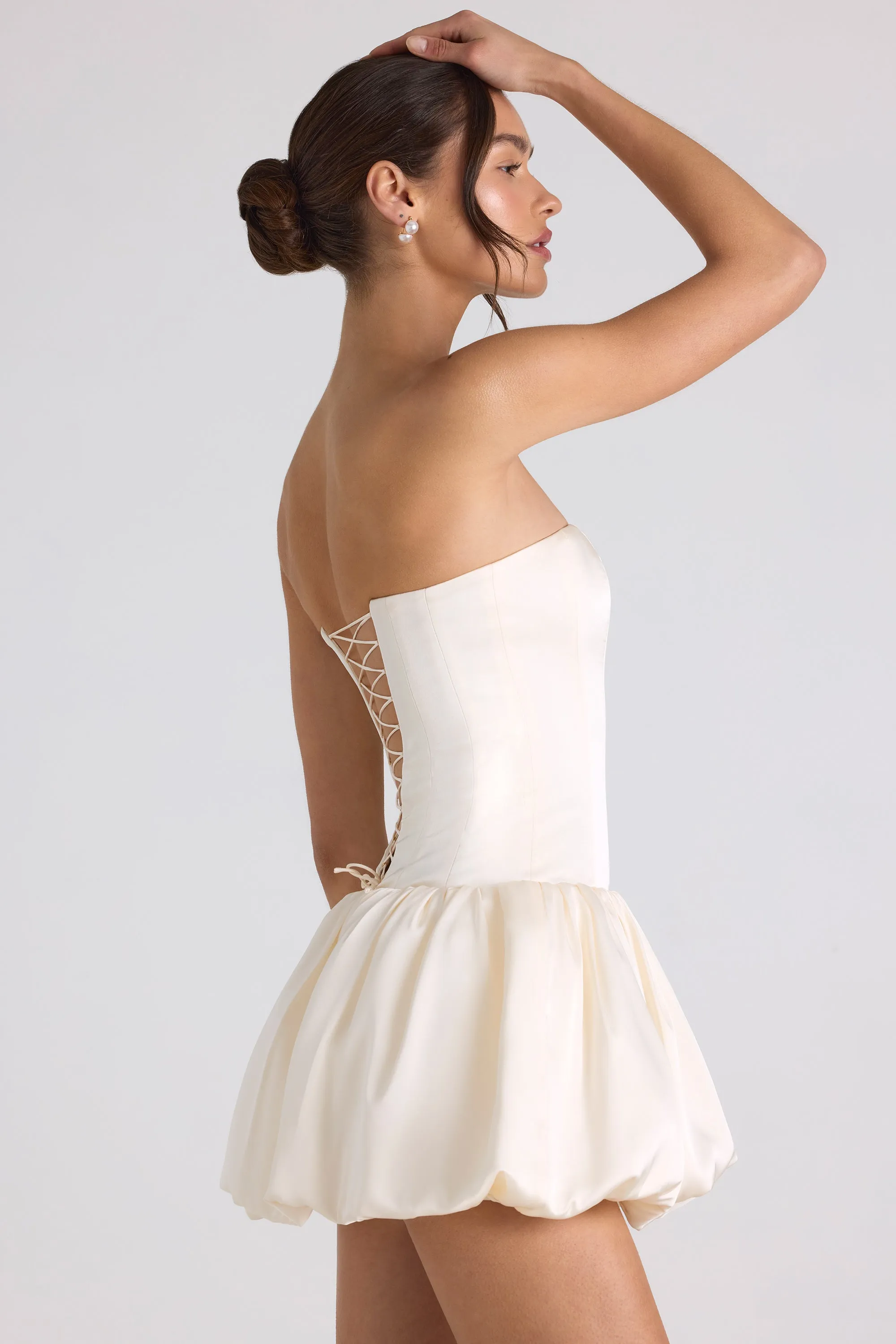 Lace-Up Bubble Hem Corset Mini Dress in Ivory sold by Oh Polly product image thumbnail 3