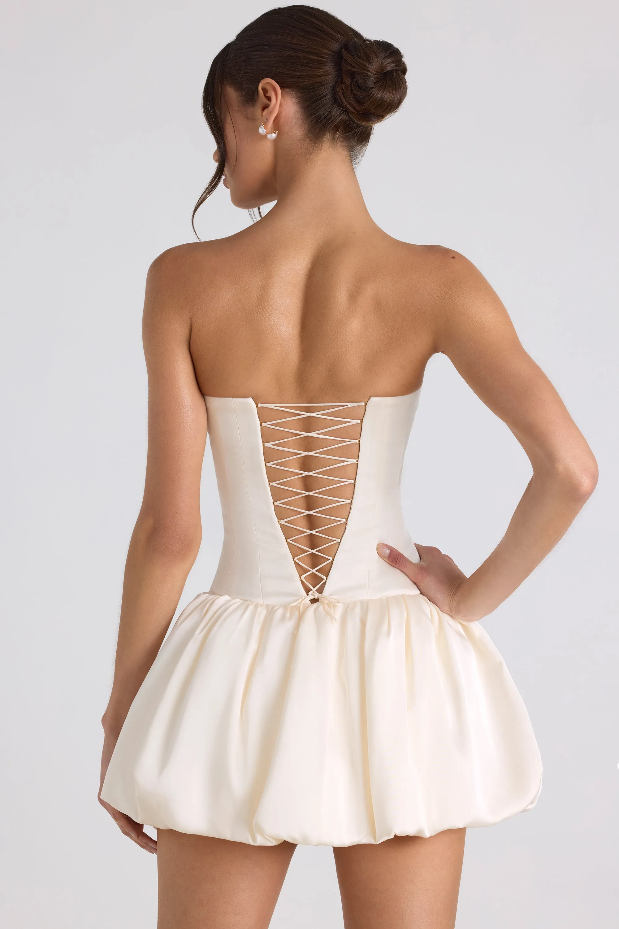 Lace-Up Bubble Hem Corset Mini Dress in Ivory sold by Oh Polly product image thumbnail 2
