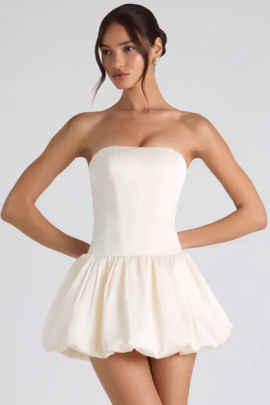 Lace-Up Bubble Hem Corset Mini Dress in Ivory made by Oh Polly