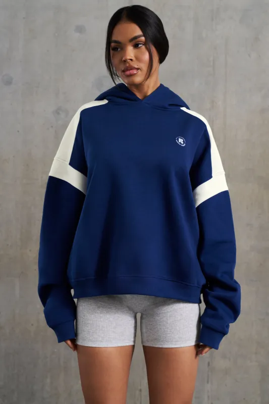 Oversized Hooded Sweatshirt in Navy sold by Oh Polly