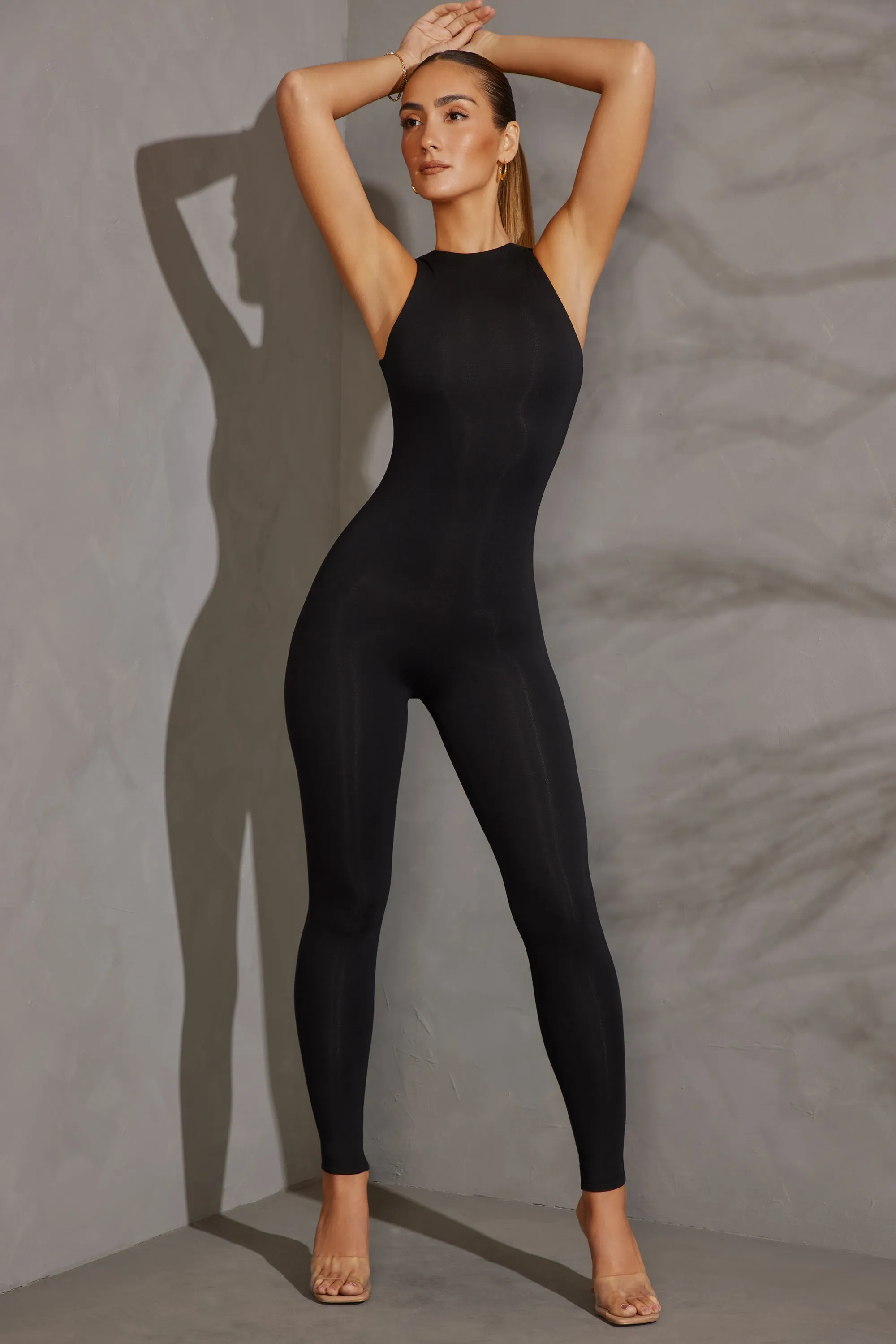 Racer Neck Jumpsuit in Black sold by Oh Polly product image thumbnail 4