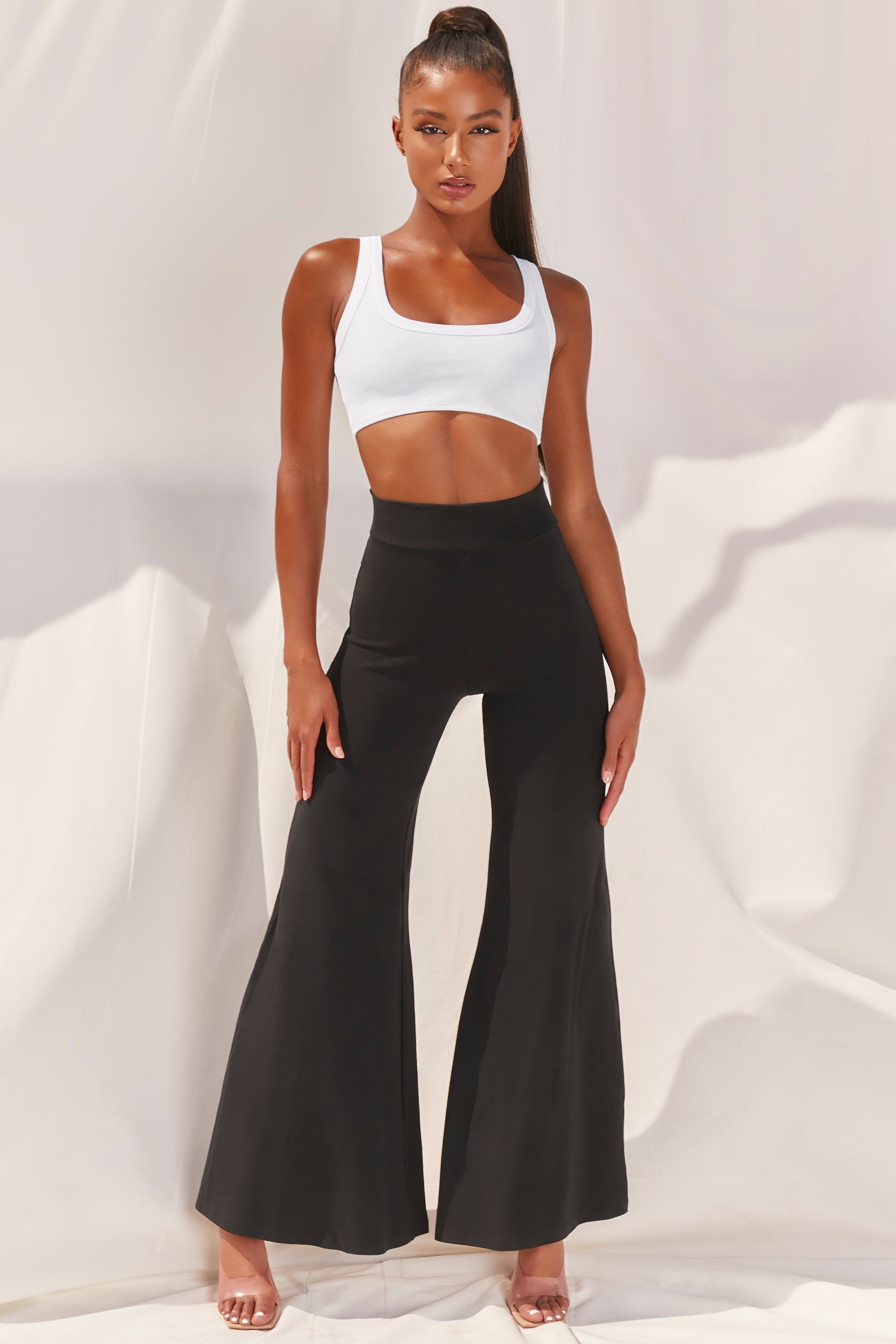 Cutting A Fine Figure Flared Trousers in Black sold by Oh Polly product image thumbnail 2