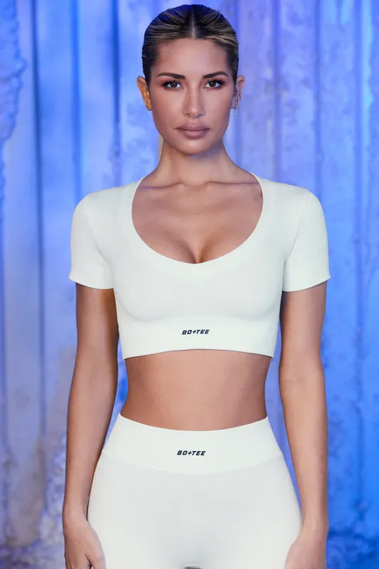 V Neck Short Sleeve Crop Top in White sold by Oh Polly