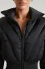 Ribbed Puffer Jacket in Black sold by Oh Polly