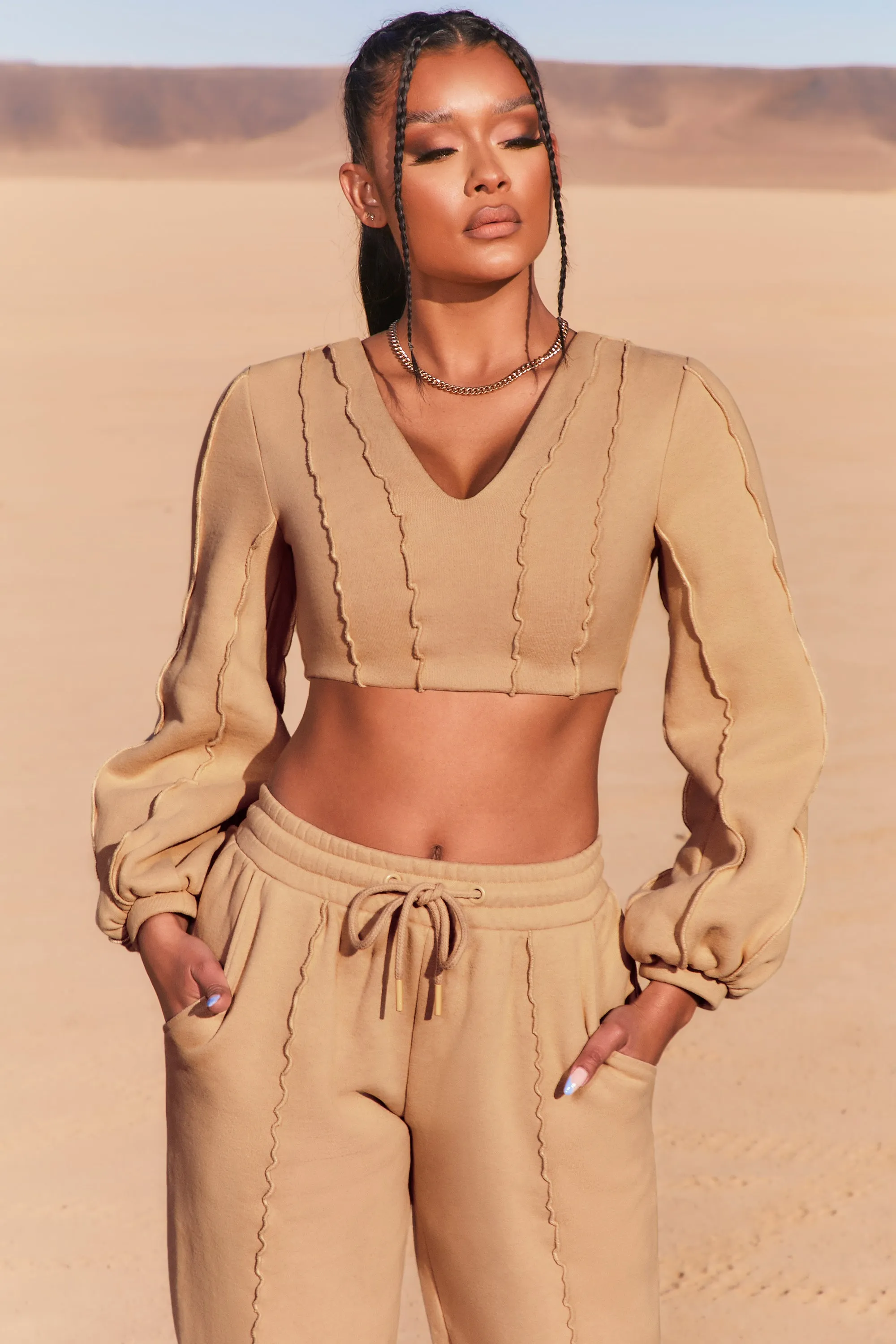 Uncovered Exposed Seam Bardot Crop Top in Beige sold by Oh Polly