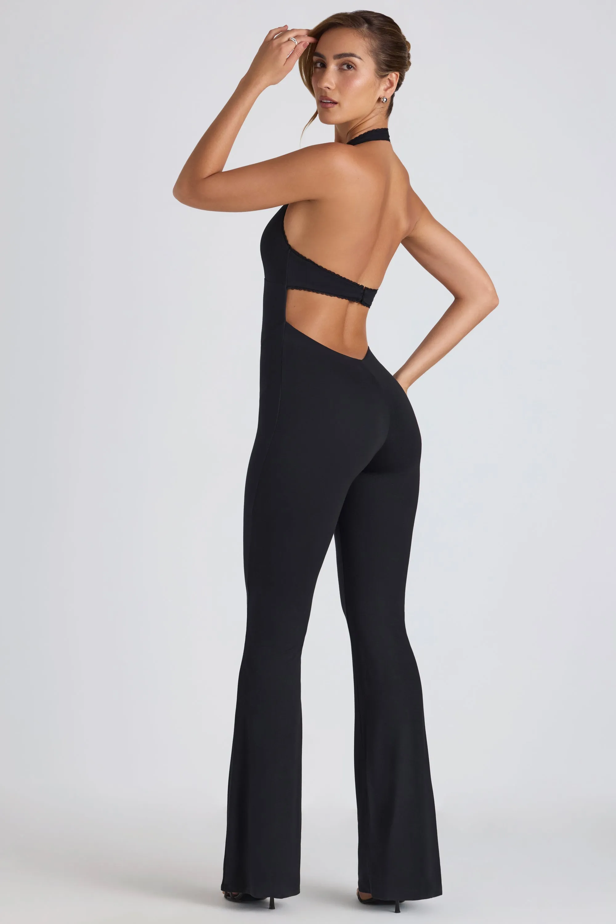 Tall Modal Lace-Trim Cut-Out Flared Jumpsuit in Black sold by Oh Polly