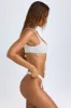 Cheeky Bikini Bottoms in White sold by Oh Polly