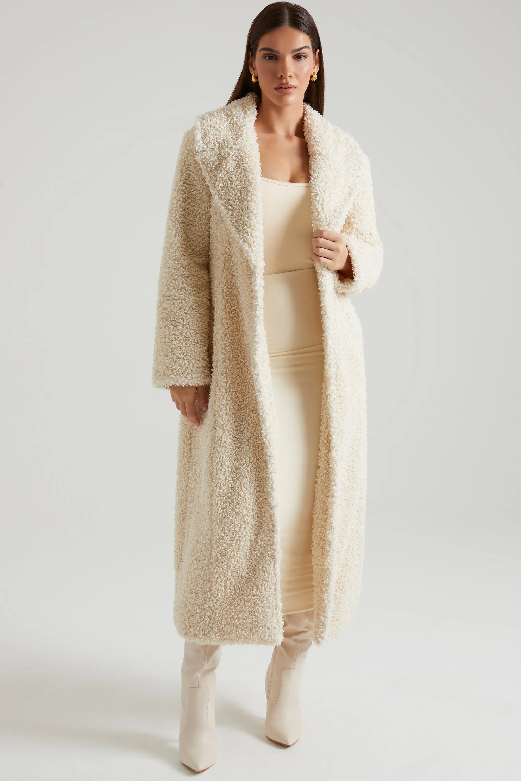 Long Shearling Coat in Cream sold by Oh Polly