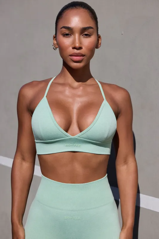Super Sculpt Seamless Triangle Sports Bra in Pistachio sold by Oh Polly