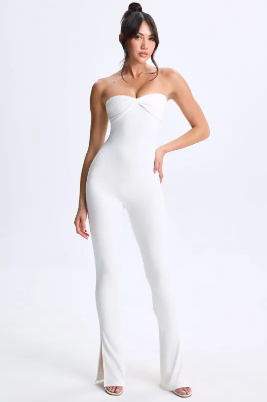 Twist-Front Split Hem Flared Jumpsuit in White sold by Oh Polly