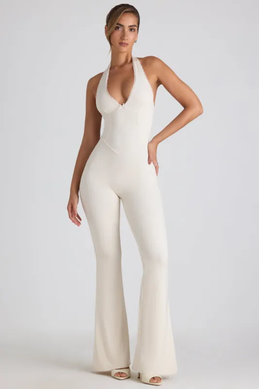 Petite Modal Lace-Trim Cut-Out Flared Jumpsuit in Ivory sold by Oh Polly